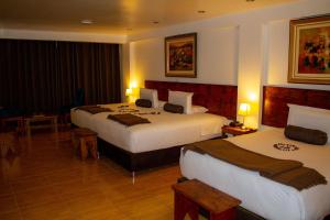 Voodi või voodid majutusasutuse Hotel Tara Machupicchu toas