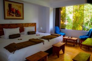 Voodi või voodid majutusasutuse Hotel Tara Machupicchu toas