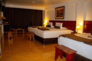 Voodi või voodid majutusasutuse Hotel Tara Machupicchu toas