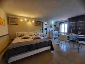 A bed or beds in a room at Le MURA MEDIEVALI
