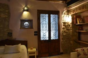 Postel nebo postele na pokoji v ubytování B&B Il Melograno del Garda