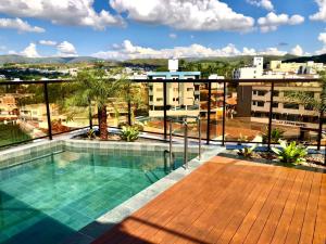 a swimming pool on the roof of a building at Serravita Hotel in Piauí