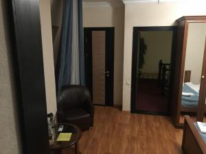 Postel nebo postele na pokoji v ubytování Отель Ренессанс