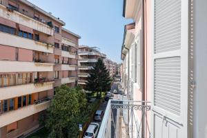 a view of a city street from a balcony at AriediParma Appartamenti in Parma