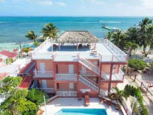 an aerial view of a house on the beach at Caye Caulker Condos in Caye Caulker