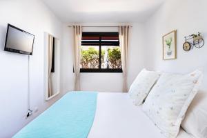 Postel nebo postele na pokoji v ubytování El Paraíso - Costa Adeje - CanaryHousing