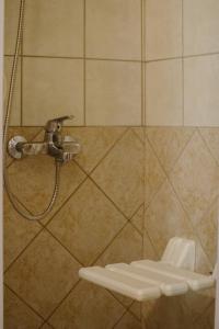 A bathroom at Grand Hotel Dentro Még 37 kép