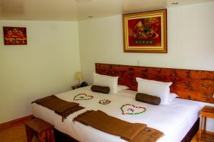 Voodi või voodid majutusasutuse Hotel Tara Machupicchu toas