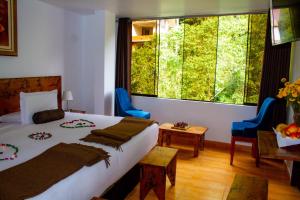 Voodi või voodid majutusasutuse Hotel Tara Machupicchu toas