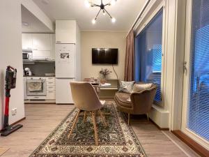 TV a/nebo společenská místnost v ubytování Lapland Romance Apartment