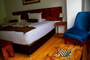 Voodi või voodid majutusasutuse Hotel Tara Machupicchu toas