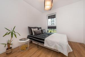 En eller flere senge i et værelse på Cubic Home + 16 billeder