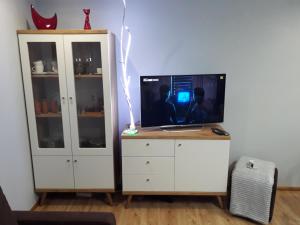 TV a/nebo společenská místnost v ubytování Luz Blues