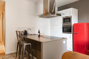 Kuchyňa alebo kuchynka v ubytovaní Central Suites Barcelona