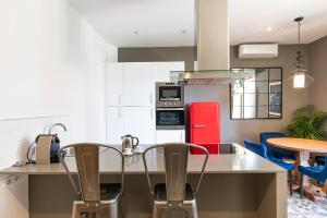 Kuchyňa alebo kuchynka v ubytovaní Central Suites Barcelona