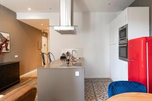 Kuchyňa alebo kuchynka v ubytovaní Central Suites Barcelona