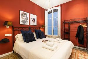 Posteľ alebo postele v izbe v ubytovaní Central Suites Barcelona