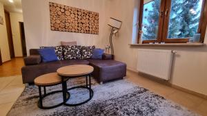 Posezení v ubytování PRESTIGE PARK apartament z tarasem i parkingiem