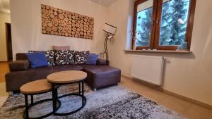 Posezení v ubytování PRESTIGE PARK apartament z tarasem i parkingiem