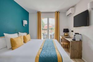 Katil atau katil-katil dalam bilik di Best Western Le Vauban