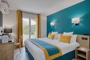 Katil atau katil-katil dalam bilik di Best Western Le Vauban