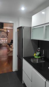 A kitchen or kitchenette at Luxury apartment arinaga