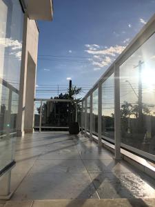 Ein Balkon oder eine Terrasse in der Unterkunft Suíte privativa próxima ao Sesc 1