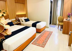 Voodi või voodid majutusasutuse ESSY Hotel KL Sentral toas