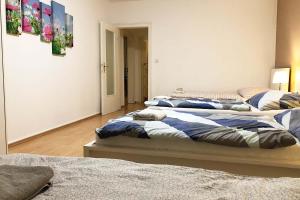 Postel nebo postele na pokoji v ubytování Ferienwohnung Neuss