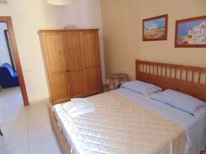 A bed or beds in a room at Residence Massilor