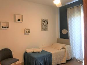 Vuode tai vuoteita majoituspaikassa Apartamento junto al río en entrada ruta Cahorros