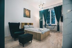 Posteľ alebo postele v izbe v ubytovaní YOURAPART STARÓWKA z JACUZZI