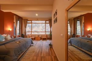 Postel nebo postele na pokoji v ubytování Zostel Dobhi, Manali