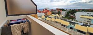 En balkong eller terrasse på Rooftop - L'Appartement en Haut