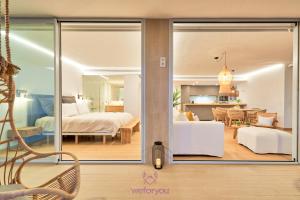 A bed or beds in a room at weforyou Med One Exclusive Sea Views 3 Bedrooms Apartament A 3A