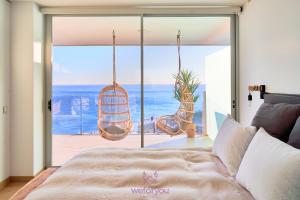 A bed or beds in a room at weforyou Med One Exclusive Sea Views 3 Bedrooms Apartament A 3A