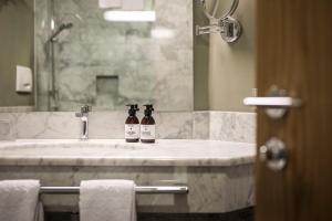 Koupelna v ubytování Hotel Weingut Stroblhof