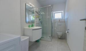 Koupelna v ubytování Apartment Ma_Lu + 37 fotografií