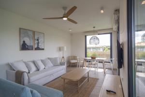 A seating area at OCEANSUITESLANGRE