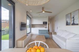A seating area at OCEANSUITESLANGRE