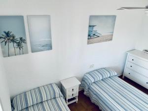 Postel nebo postele na pokoji v ubytování CASA DUPLEX BUNGALOW Dénia + 35 fotografií