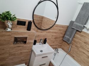 Kúpeľňa v ubytovaní Apartament Nova przy S3