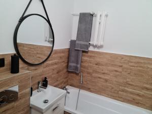 Kúpeľňa v ubytovaní Apartament Nova przy S3