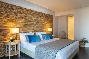 Postel nebo postele na pokoji v ubytování Eden Roc Resort - All Inclusive + 37 fotografií