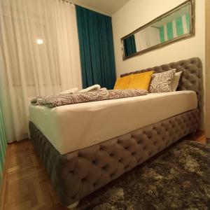 Postel nebo postele na pokoji v ubytování Daniris apartman