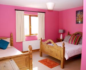 Cama o camas de una habitación en Achill Lodge Guest House