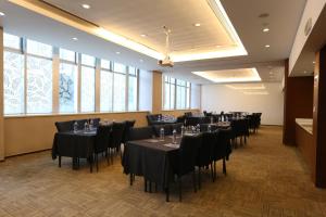 Ein Restaurant oder anderes Speiselokal in der Unterkunft Holiday Inn Express Shanghai Jinsha by IHG 