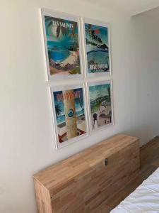 Postelja oz. postelje v sobi nastanitve Studio "Ti Joyau", vue mer, piscine, classé Tourisme 4 étoiles