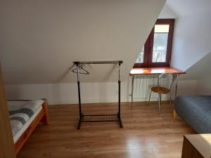 Łóżko lub łóżka w pokoju w obiekcie Mroczkówka