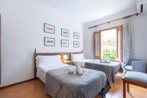 Postel nebo postele na pokoji v ubytování Villa Ànecs